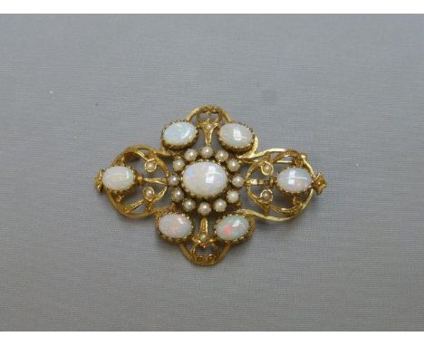 A 9ct gold seven stone opal and pearl brooch. 