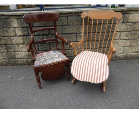 A beech rocking chair and a Victorian mahogany elbow commode/chair.