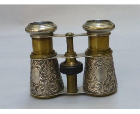 A silver covered pair of binoculars impressed 'The Touring Club, London to Paris', London 1914/1915.