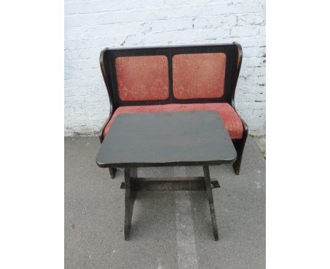 A small two seater wooden settle and side table. 