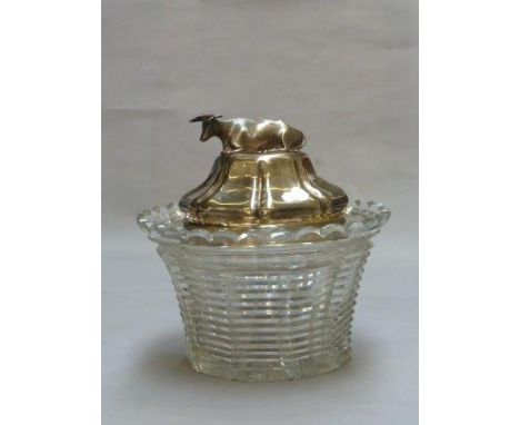 A Georgian cut glass and silver lidded pot, the finial in the form of a recumbent cow, maker Hy Wilkinson and Co., Sheffield 