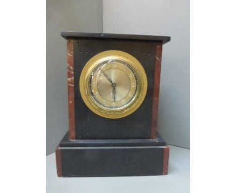 A slate and marble mantle clock. 