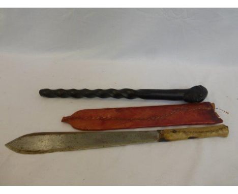 An ebony native African part walking stick/club, the knop in the form of a native African head, a native machete with hid sca