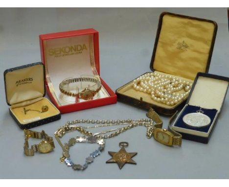 An assortment of mixed collectables including a silver gilt Rotary ladies wristwatch.