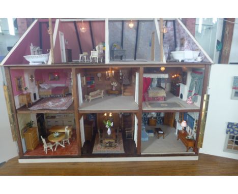 A beautiful 12th scale country manor style dolls house, Haversham hall comes completely furnished with carpets, wood flooring