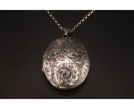 Large Oval engraved Silver Locket on Belcher chain 60cm in Length. 35g total weight 