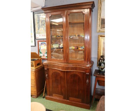 19thC Mahogany veneered glazed serpentine fronted dresser with panel doors 