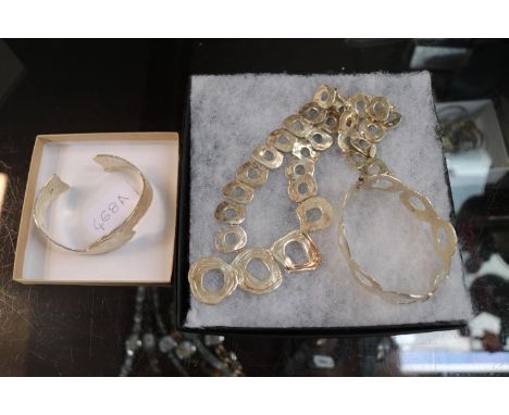 Collection of Silver hammered Contemporary Jewellery to include 2 Bangles and a Necklace 122g total weight 