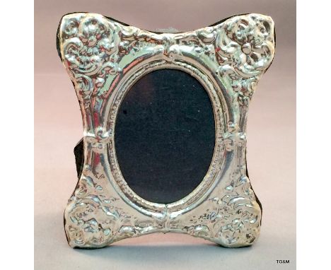 A silver easel back picture frame