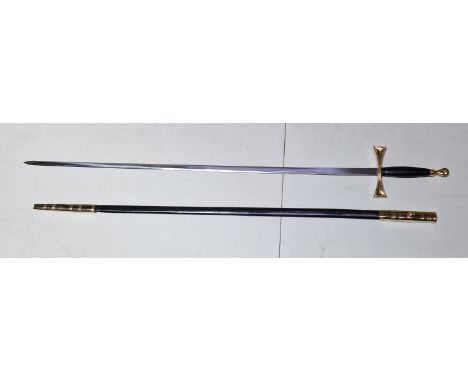 A masonic or society sword, plain slender blade, approx. 72cm length, gilt hilt with cruciform cross guard, ovoid pommel, lea