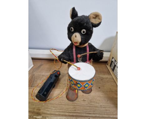 A vintage Barney Bear 'The Drummer' battery operated Remote controlled toy. Condition- there are no batteries so unsure if th