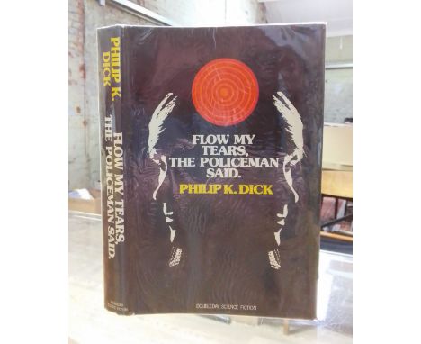 Philip K. Dick, Flow My Tears, The Policeman Said., 1st edition, Doubleday &amp; Company, New York 1974.