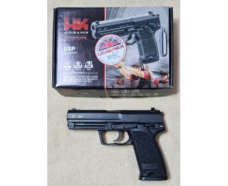 A Heckler &amp; Koch .177 calibre Co2 USP air pistol, 20cm long, in original box with manual. (BUYER MUST BE 18 YEARS OLD OR 