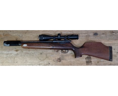 A Titan .22 calibre pcp air rifle with an Nikko Srirling 3-9x40 AO mountmaster sight, serial no.96134, 87cm long. (BUYER MUST