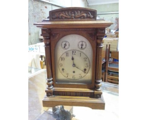 An oak cased bracket clock, height 45cm.  