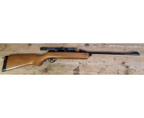 A B.S.A. Meteor .22 calibre air rifle with a B.S.A. 4 x 20 telescopic sight, 105cm long. (BUYER MUST BE 18 YEARS OLD OR ABOVE