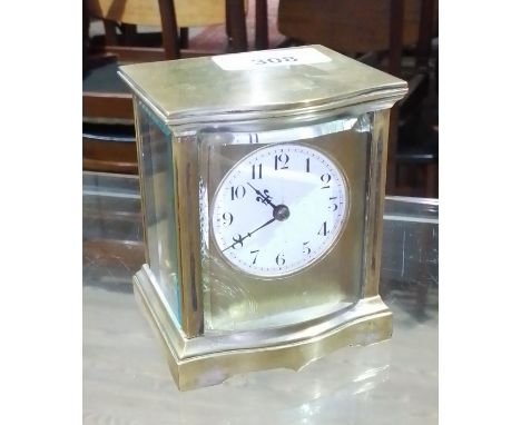 A small brass carriage clock.  