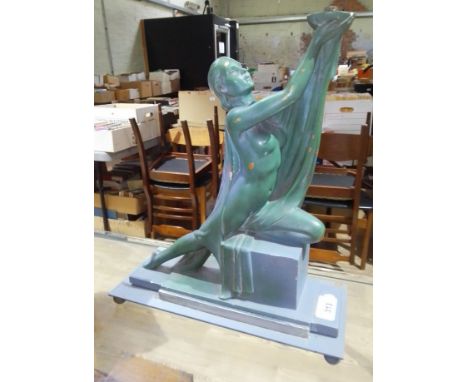 An Art Deco table lamp modelled as a woman, RD 817178 243, height 37cm.Condition:- General wear through age, some small chips