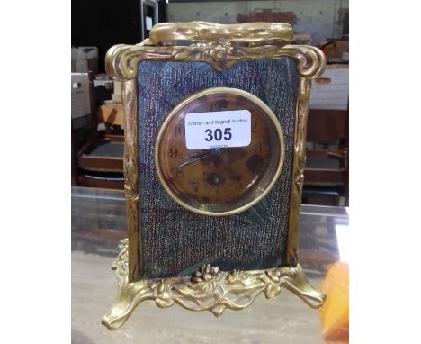 A French Art Nouveau style carriage clock with alarm, height 22cm.  