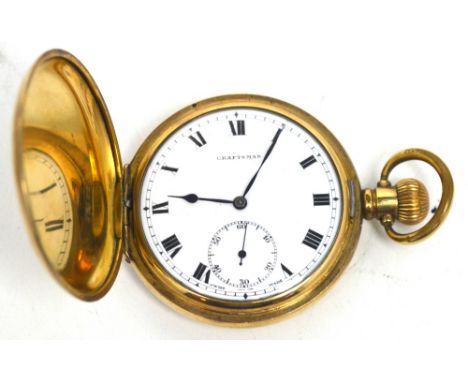 A gold plated crown wind full hunter pocket watch the enamel dial set with Roman numerals and subsidiary seconds hand, inscri