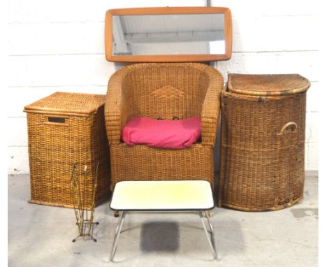 A wicker tub chair, two wicker linen baskets, a G-Plan style wall mirror, a vintage magazine rack and a retro collapsible tab