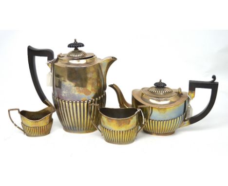 A Victorian hallmarked silver four-piece tea service, a teapot, hot water pot, milk jug and sugar bowl, Birmingham 1900, appr