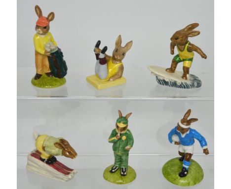 Six Royal Doulton 'Bunnykins' figures; DB31 'Downhill Bunnykins', DB318 'Rugby Player Bunnykins', limited edition no.17/1000,