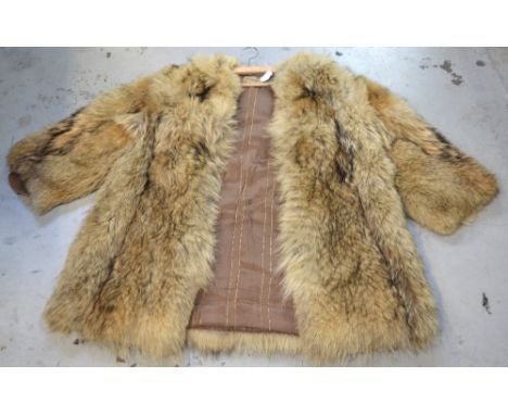 A vintage fox fur jacket with interior label for 'William Creamer & Co Liverpool'.