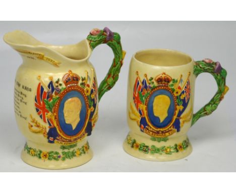 A Crown Devon musical jug commemorating Edward VIII, who abdicated on December 10th 1936, height 20cm and a smaller matching 