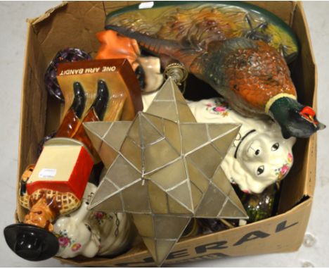 A large ceramic decanter in the form of a wild ring-necked pheasant, a limited edition produced for Mike Wayne Distilling Com