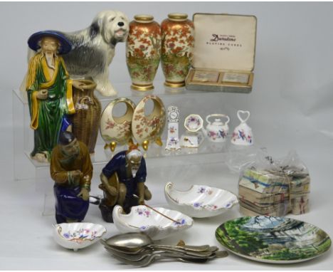 A collectors' lot comprising three Oriental models of fishermen, a Coopercraft 'Dulux' dog, cigarette cards, a pair of gilt-h