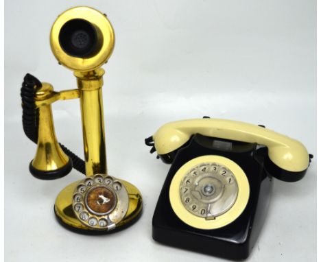 A vintage brass stick telephone and a smaller retro cream and black telephone (2).