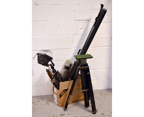 A selection of photographic equipment and accessories to include a Gnome 35mm enlarger projector, vintage camera tripods of v