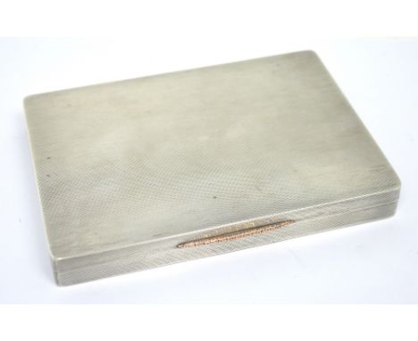 A George VI hallmarked silver engine turned cigar box with gilt wash interior, retailed by Fortnum & Mason, London 1937, widt