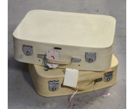 Two vintage c1959 'Revelation' cream suitcases with an original travel label 'Venice-Simplon Express' (2).
