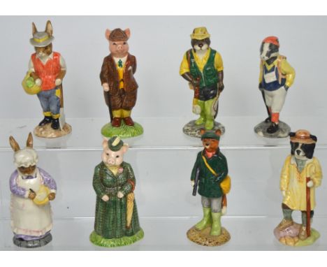 Eight Beswick ceramic figures; 'Mrs Rabbit Baking', 'Gardener Rabbit', 'Huntsman Fox' (af), 'Gentleman Pig', 'The Lady Pig', 