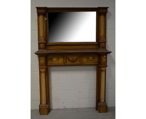 A contemporary stained pine fire surround and overmantel mirror in the Georgian style, height approx 200cm, width approx 140c