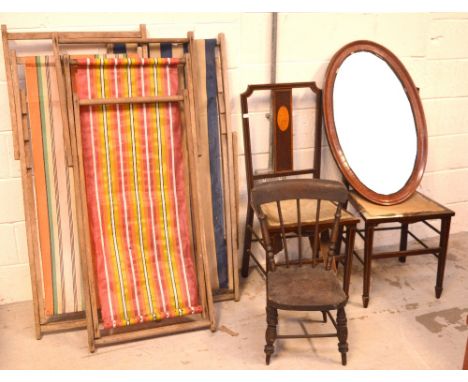 Three vintage deckchairs, a pair of Edwardian mahogany and inlaid dining chairs, a small stick back child's chair and a mahog