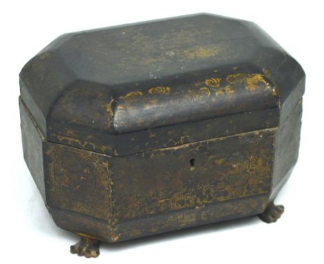 A Chinese gilt-heightened lacquered tea caddy on four outstretched paw supports, width 23cm.