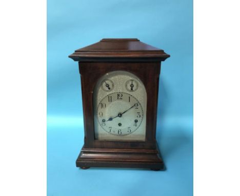 A mahogany cased mantle clock