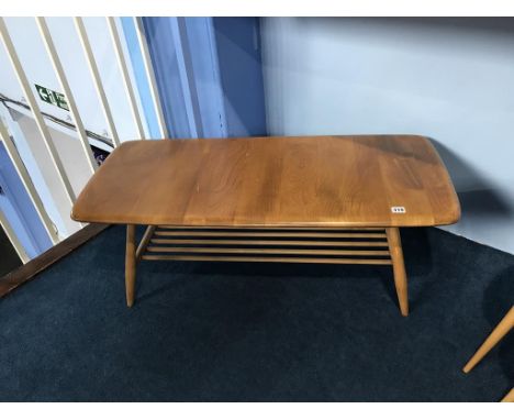 A rectangular Golden Dawn Ercol coffee table