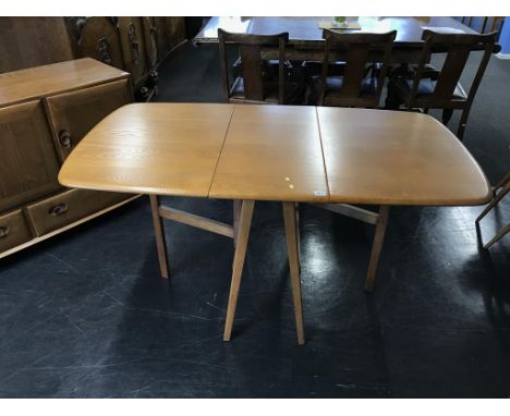 An Ercol Golden Dawn gate leg dining table