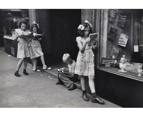 Ruth Orkin (American 1921-1985)   Comic book readers, Greenwich Village, NYC, circa 1945-49   Gelatin silver print   Indistin