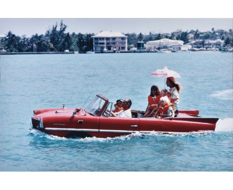 Slim Aarons (American 1916-2006)   Kevin and Bobo McClory and family in Nassau, c. 1965   C-type print   Signed in ink, dated