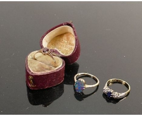 Three gold gem set rings 9ct &amp; 18ct: Includes 18ct diamond &amp; sapphire ring size M, 9ct  garnet ring in box size M &am