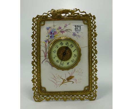Brass Tile Framed Mantle Clock: frame with dragon decoration, damaged tile with floral decoration, height 29cm 