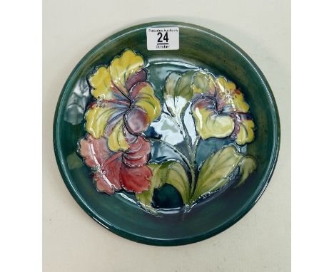 Moorcroft Hibiscus charger: on green. 26cm diameter 