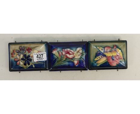 Three Walter Moorcroft design rectangular box lids: each 12 x 9cm. (3) 