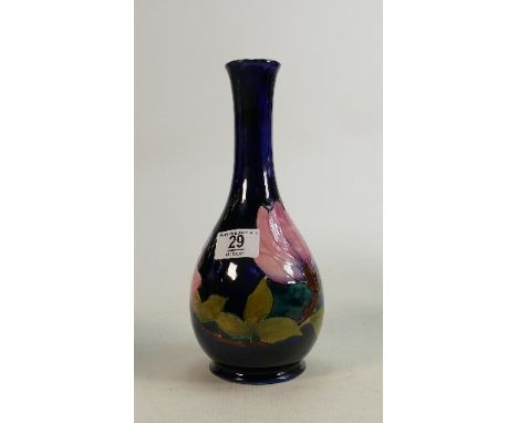 Moorcroft pink magnolia on blue vase: Height 27cm 