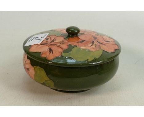 Moorcroft Hibiscus on green lidded pot: 13.5cm diameter 